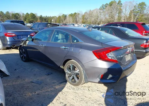 2017 Honda Civic Touring z USA, uszkodzony, nr VIN 19XFC1F91HE019219
